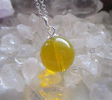 Dominican Blue Amber Bead Sphere Pendant Necklace
