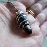 Dominican Green Amber Leather Wrapped Bullet Pendant