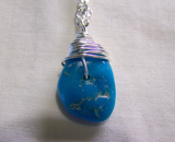 Natural Sleeping Beauty Turquoise Wire Wrapped Pendant