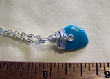 Natural Sleeping Beauty Turquoise Wire Wrapped Pendant
